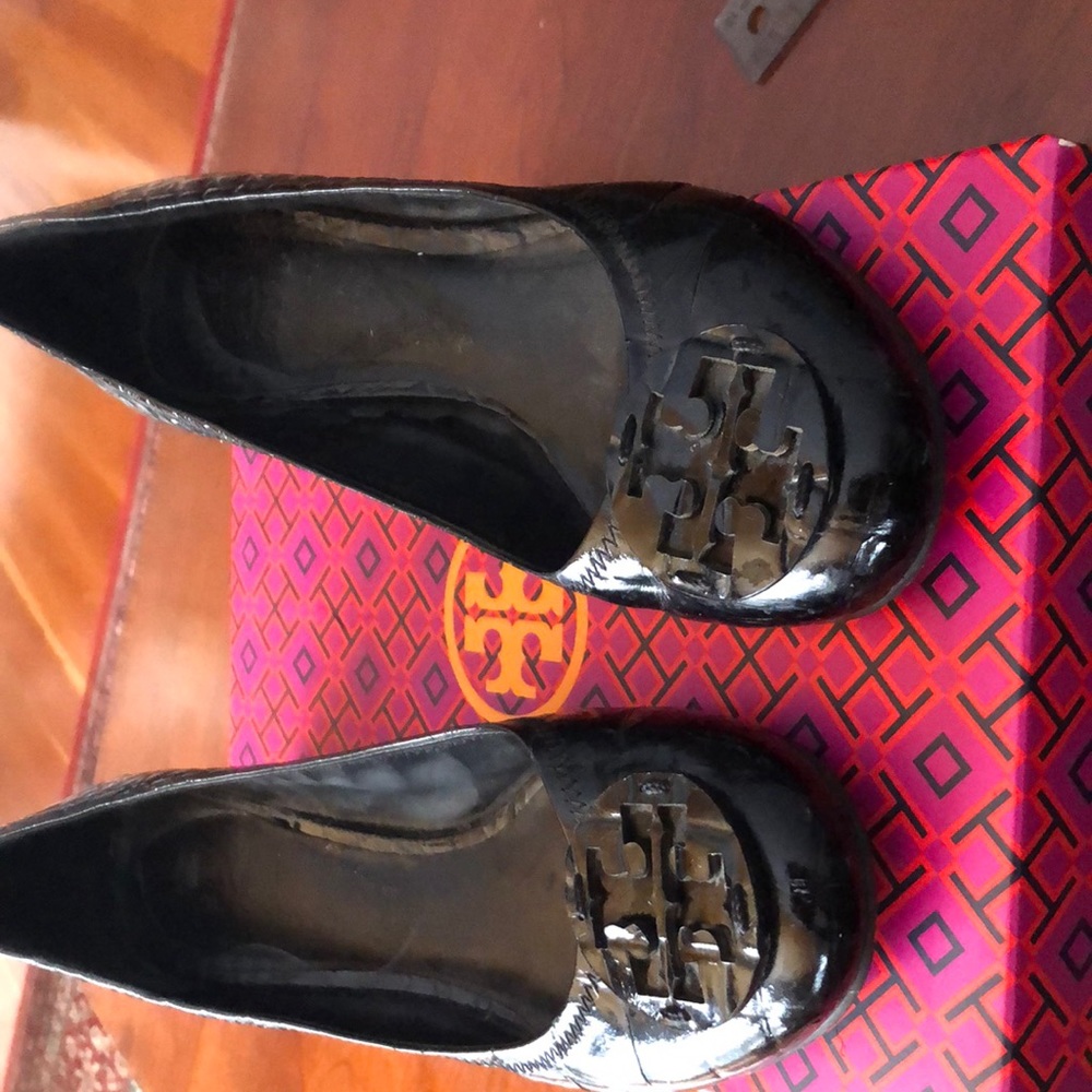 Tory Burch black quilted patent leather heels.